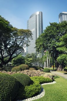 Ayala Tower One view from Ayala Triangle Gardens. It its one of the tallest building in the Philippines, (160 metres (525 feet)),  home of the Philippine Stock Exchange.