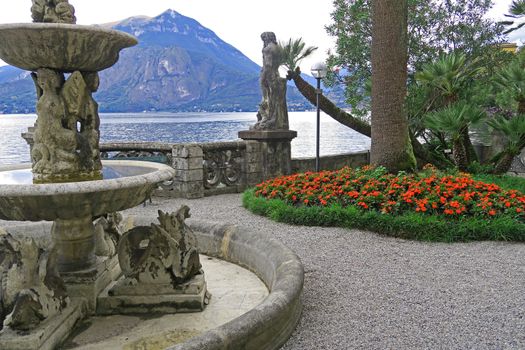 view of a garden with fountain a Varenna, Como lake, Italy