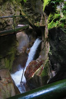 Roaring waterfall of the Pioverna river that forms the Bellano gorge,near Como Lake,Italy