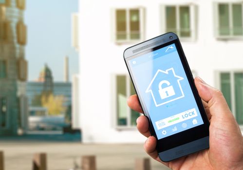 smart house, home automation, device with app icons. Man uses his smartphone with smarthome security app to unlock the door of his house.