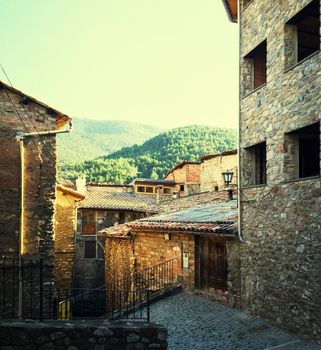 Stone buildings in medieval town of Baga. Catalonia, Spain.