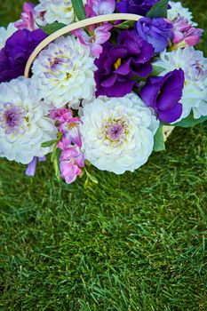 bouquet of flowers on the green grass with copy paste