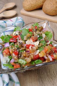Salad of roasted eggplant with tomatoes, peppers, and cilantro