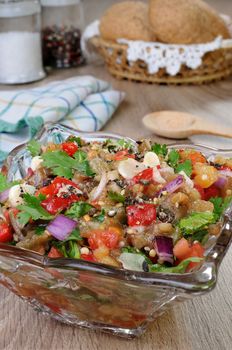 Salad of roasted eggplant with tomatoes, peppers, and cilantro