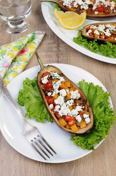 Stuffed eggplant with ricotta and vegetables in lettuce 