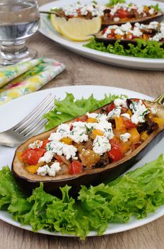 Stuffed eggplant with ricotta and vegetables in lettuce 