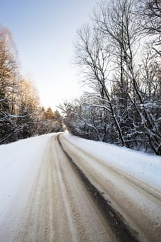   the asphalted highway in a winter season. Belarus