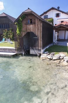 Wooden dock at alpine lake Mondsee, Austria

