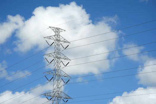 High voltage electric tower on sky background