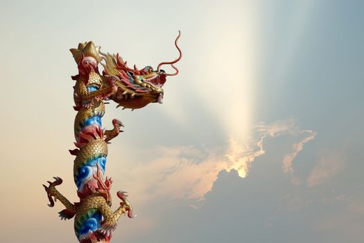  Chinese dragon with beautiful sunbeam background   