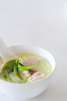 Thai  spicy chicken soup in coconut milk ,mushrooms, intensely flavor of galangal, lemongrass, kaffir lime leaf, cilantro