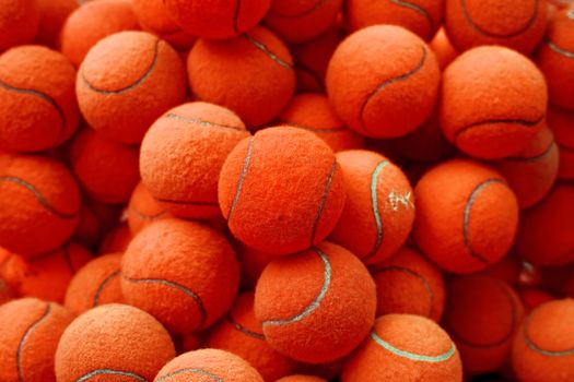 exotic red tennis ball as sport background