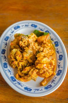 Stir fried chicken and curry paste , spicy food