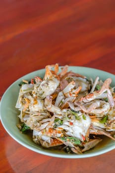 Stir fried Crab with chili & Basil leaves , spicy seafood dish