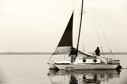 pleasure boat on water  with many peeoples 