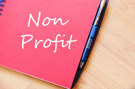 Red notepad and Non profit text concept