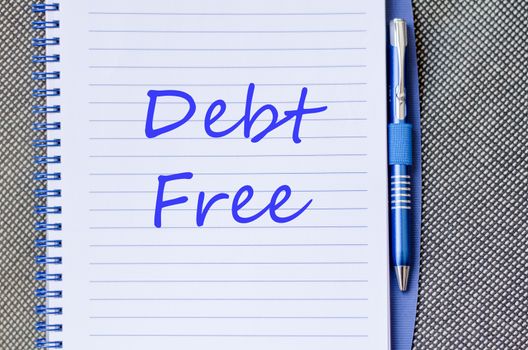 Blue notepad and Debt free text concept