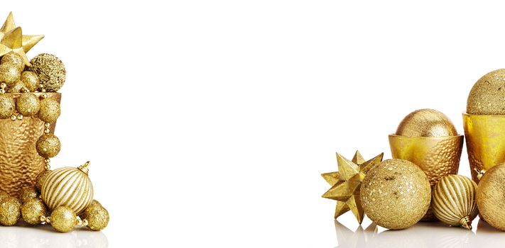 Composition of gold Christmas decorations on white background. White copy space.