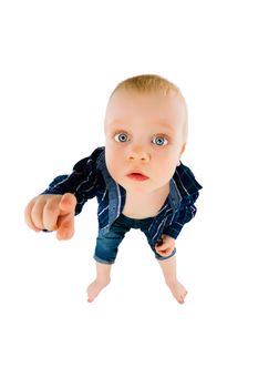 The little boy on a white background pointing her finger at the camera. Wide viewing angle