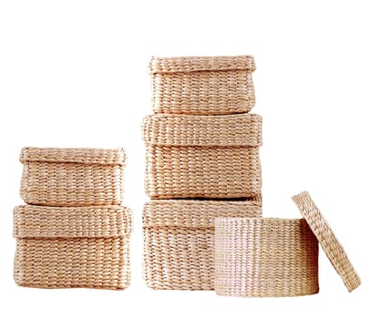 isolated round woven straw basket