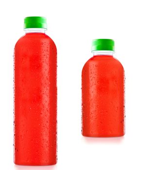 bottles fruit juice with drops of water isolated