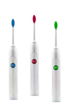 electric toothbrushes on white background