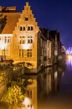 Old brick house in bruges at night

