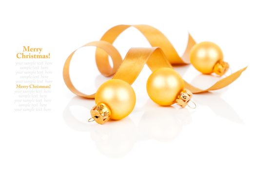 golden christmas decoration balls with satin ribbon, isolated on white background