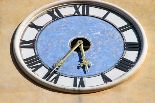 Close-up on the church clock in the medieval village of Eze, France