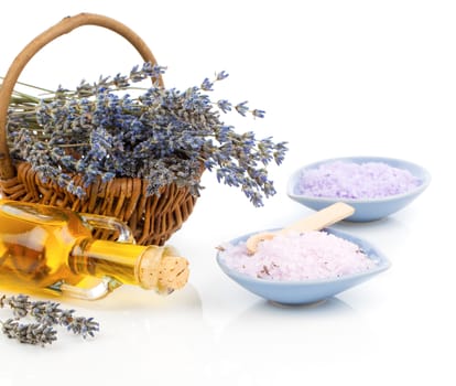 Spa still life with lavender flowers and bath salt, on white background