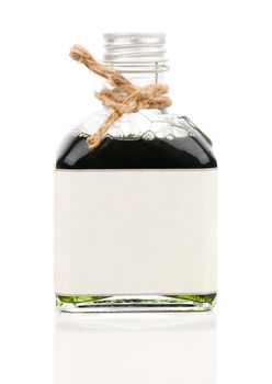 A bottle of Shower bath oil (algae bath, herbal infusions) isolated on white