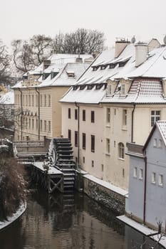 Prague Certovka mill, view from Charles Bridge in winter

