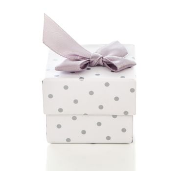 gift box present with satin bow isolated on white