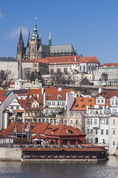 Prague castle view with a boat

