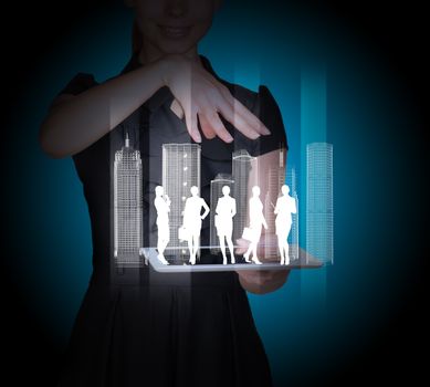 Businesspeople and 3d city model on tablet in businesswomans hands on abstract blue background