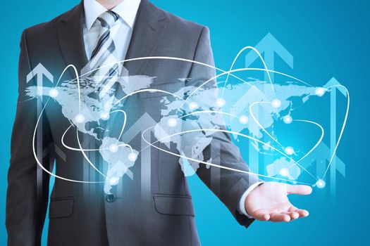 Businessman with world map model on abstract blue background