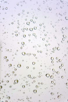 Water drops on the window. Abstract background. Shallow DOF.