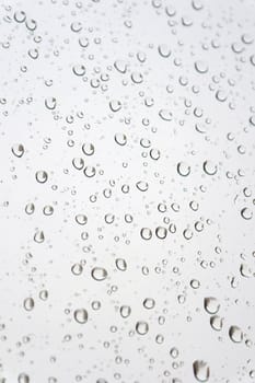 Water drops on the window. Abstract background. Shallow DOF.