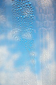 Drops of water on the crooked glass, shallow dof