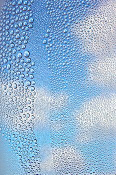 Drops of water on the crooked glass, shallow dof