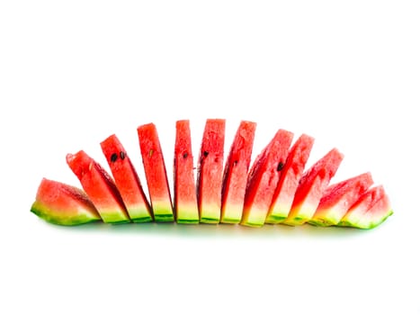 Isolated arranged watermelon slices, quarter of melon cut and piled