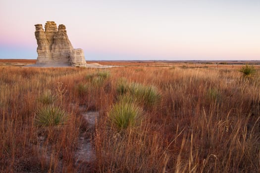 Castle Rock in Kansas is a dramatic 70-foot spire created by erosion of Smoky Hills chalk beds.
