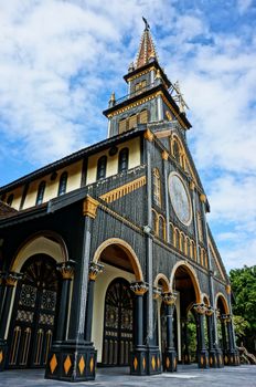 KON TUM, VIET NAM- AUG 22: Kontum wooden church, 100 years old, an ancient cathedral, religion heritage, famous place for travel, amazing architect make wonderful landscape, Vietnam, Aug 22, 2015