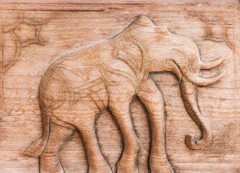Carved Thai of elephant on the wood.