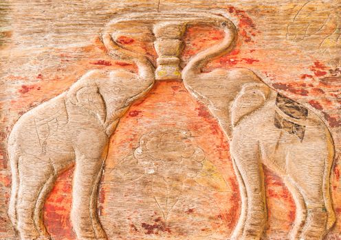 Carved Thai of elephant on the wood.