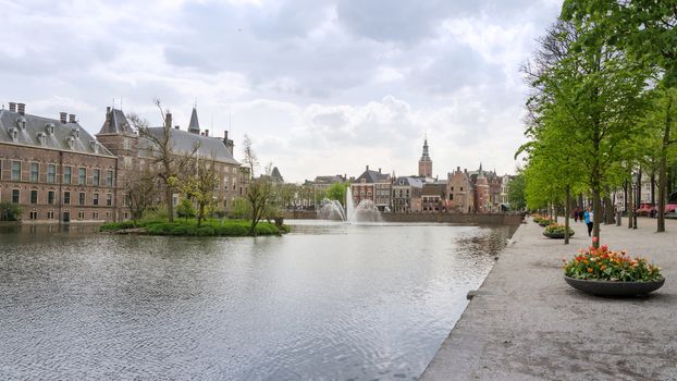 The Hague, Netherlands - May 8, 2015: People visit Famous parliament building complex Binnenhof on May 8, 2015  in The Hague, Netherlands.