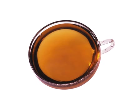 Tea in glass cup isolated on a white background