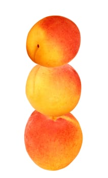 Ripe peaches on a white background