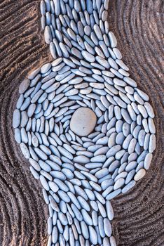 Zen meditation of rock garden concept. Balance of sand and pebbles