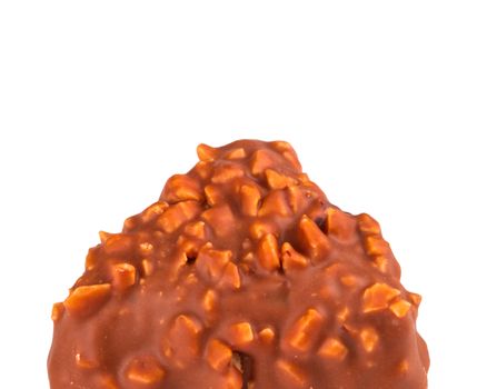 Close up of chocolate truffle on white